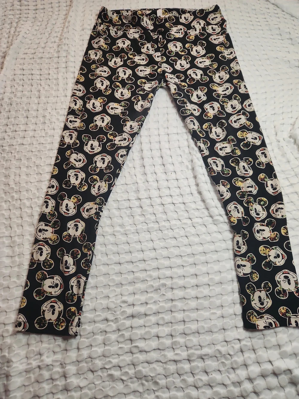 LuLaRoe Black Skinny Jeans with Cream Character Faces